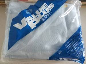 lot 61 image: VALUE PLUS 100% POLYESTER BLANKET IN UNOPENED PACKAGE AS SHOWN. MEASURES 72 X 90.