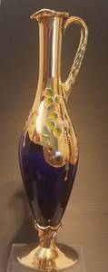lot 68 image: VINTAGE GLASS SLIM STYLE VASEPITCHER WITH GOLD DESIGN AS SHOWN. MEASURES APPROX. 13.25 H x 3.75 W. TAKE A LOOK