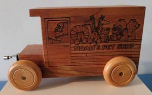 lot 94 image: VINTAGE 1980 TOYSTALGIA NOAHS PETSHOP WOODEN MUSICAL BANK IN STYLECOLORCONDITION SHOWN. MEASURES APPROX. 8.5 x 3.5 x 4.5.