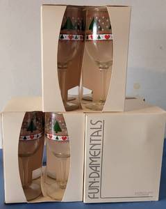 lot 98 image: VINTAGE FUN-DAMENTALS CHRISTMAS THEME GOBLET GLASSES FROM DILLARDS IN ORIGINAL BOXES AS SHOWN. 12 COUNT.