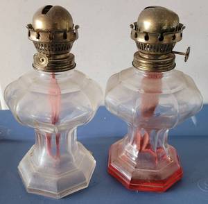 lot 107 image: VINTAGE GLASS WITH BRASS OILKEROSENE LAMPS IN STYLE AND CONDITION SHOWN. MEASURES APPROX. 4.25 x 4.25 x 8.5. (YOUR BID X 2)