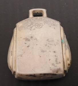 lot 117 image: VINTAGE 1930S WEBSTER CO. STERLING SILVER PURSEBACKPACK RINGING BELLBABY RATTLE PENDANT AS SHOWN. MEASURES APPROX. 1.25 x 1.25 AND WEIGHS 8 GRAMS.