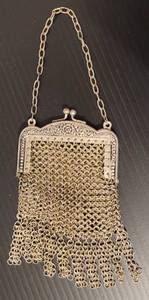 lot 123 image: RARE FIND ANTIQUE GERMAN SILVER MESH COIN PURSE IN STYLE AND CONDITION SHOWN. MEASURES APPROX. 4.25 x 2 38. CHECK IT OUT