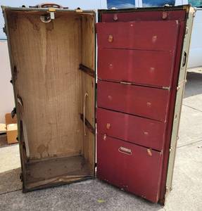 lot 150 image: ANTIQUE WARDROBE-STYLE STEAMER TRUNK IN STYLECOLORCONDITION SHOWN. MEASURES APPROX. 22.5 x 22.5 x 51. TAKE A LOOK