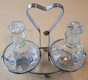 lot 175 image: VINTAGE OIL AND VINEGAR SET WITH METAL HOLDER IN STYLECOLORCONDITION SHOWN.