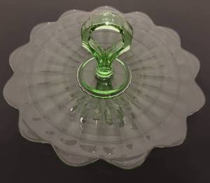 lot 183 image: VINTAGE GLASS COOKIE SERVING DISH  PLATTER WITH CENTER HANDLE IN EXCELLENT CONDITION AS SHOWN. MEASURES APPROX. 11.25 W x 4.5 H.