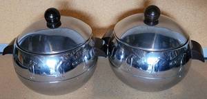 lot 209 image: VINTAGE WEST BEND PENGUIN HOT  COLD SERVERS IN STYLE AND CONDITION SHOWN.
