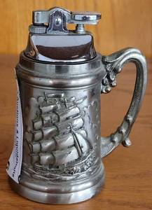 lot 6 image: VINTAGE NAUTICAL THEMED LIGHTER IN STYLE AND CONDITION SHOWN.