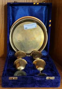 lot 7 image: VINTAGE BRASS CUP AND TRAY SET WITH CASE IN STYLE AND CONDITION SHOWN. MADE IN INDIA.