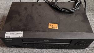 lot 12 image: CLASSIC VHS VCR MODEL VCR4000 AS SHOWN.