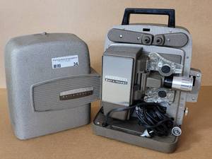 lot 34 image: VINTAGE BELL & HOWELL 8MM MOVIE PROJECTOR MODEL 245 PA AS SHOWN.