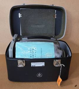 lot 38 image: VINTAGE BOLEX PAILLARD 8MM FILM PROJECTOR MODEL 18-5 WITH ORIGINAL MANUAL AND STORAGE CASE AS SHOWN. MUST SEE