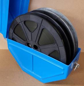 lot 54 image: VINTAGE MOVIE REEL BOX WITH 3 FILM STRIPS AS SHOWN.