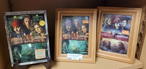 lot 81 image: PIRATES OF THE CARIBBEAN DVD MOVIE AND MEMORABILIA AS SHOWN.