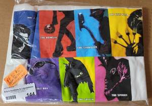 lot 144 image: MYSTERY MAN MOVIE THEMED T-SHIRT AS SHOWN.