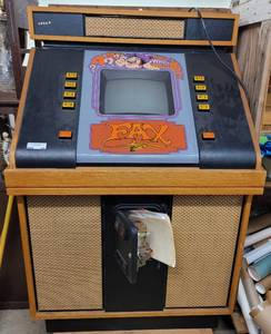 lot 169 image: VINTAGE FAX ARCADE GAME MACHINE WITH MANUALPAPERWORK AS SHOWN.