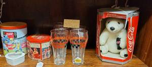 lot 240 image: COCA-COLA ITEMS INCLUDING GLASSES, TRINKET BOX, TIN CONTAINERS, AND MORE AS SHOWN.