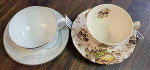 lot 276 image: LOT OF 2 TEA CUP AND SAUCER SETS IN STYLEDESIGNSBRANDS AS SHOWN.