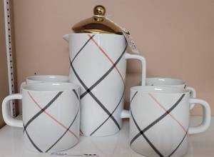 lot 291 image: CERAMIC COFFEE POT WITH GILDED LID AND CUPS AS SHOWN.