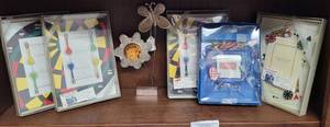 lot 301 image: LOT OF MAGNETIC PICTURES FRAMES IN VARIOUS THEMES PLUS MORE AS SHOWN.