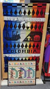 lot 309 image: LOT OF 2 HAND MADE WALL DECOR PIECES FROM COLOMBIA IN STYLESCOLORS SHOWN.