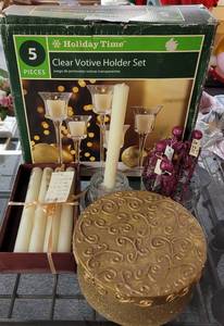 lot 321 image: LOT OF CLEAR VOTIVE HOLDER SET, CANDLE STICKS, AND DECOR AS SHOWN.