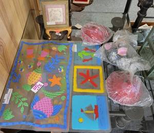lot 338 image: ASSORTED PLASTIC PLACEMATS, ANIMAL ART MADE WITH COCONUTS AS SHOWN.