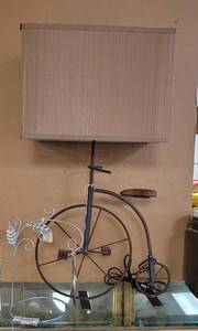 lot 343 image: WROUGHT IRON STYLE BIKE SHAPED LAMP WITH WOOD ACCENTS, METAL ORNAMENT HANGER, OUTER BANKS SUNCATCHER AS SHOWN.
