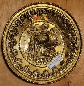 lot 356 image: VINTAGE PRESSED BRASS STYLE PLATE IN STYLECOLORCONDITION SHOWN. 12 DIAMETER.