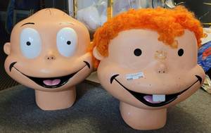 lot 376 image: 2 RUGRATS COSTUME HEADS AS SHOWN.