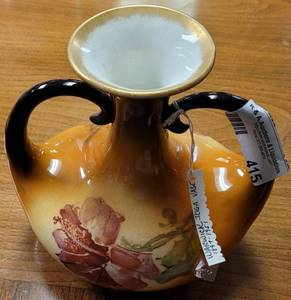 lot 415 image: ANTIQUE WARWICK IOGA DOUBLE-HANDLE VASE IN STYLECOLORCONDITION SHOWN. CIRCA 1890S - 1900S.