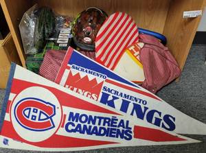 lot 444 image: ASSORTED SPORTSGAME LOT INCLUDING PENNANTS, TENNIS RACKETS, HELMET, 2 NEW BACKGAMMONCHESS SETS, AND MORE AS SHOWN.