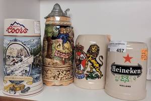 lot 457 image: VINTAGE 1992 STEIN MUG, BCM MUSICAL STEIN, 2 VINTAGE HEINEKEN CERAMIC MUGS AS SHOWN.