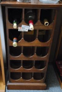lot 507 image: WOOD WINE BOTTLE HOLDERCABINET IN STYLECOLORCONDITION SHOWN.