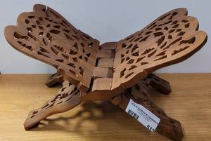 lot 513 image: CARVED HARDWOOD BOOKBIBLECOOKBOOK STAND IN STYLECOLOR AS SHOWN.