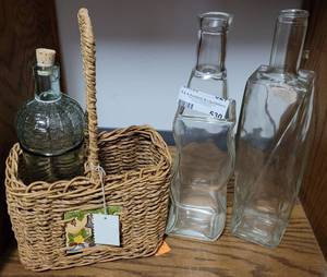 lot 530 image: GLASS BOTTLESDECANTERS, BASKET, DECORATIVE WINE BOTTLE AS SHOWN.