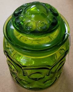 lot 545 image: VINTAGE EMERAL GREEN PRESSED GLASS CANISTER AND GREEN GLASS FOOTED COMPOTE AS SHOWN.