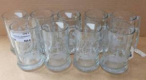 lot 564 image: 9 ETCHED GLASS STYLE THICK GLASS WITH HANDLE MUGS WITH COLUMBUS VOYAGE, LA NINA, SANTA MARIA DESIGNS AS SHOWN.