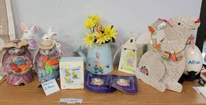 lot 566 image: EASTER  BUNNIES LOT INCLUDING CLOTH FLAG, METAL BUNNY, TEA LIGHT HOLDERS, BUNNY FIGURES AND MORE AS SHOWN.