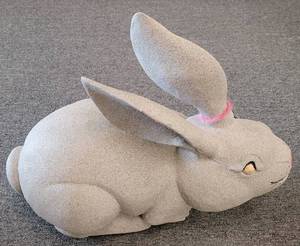 lot 569 image: LARGE SIZE CONCRETE STYLE BUNNY IN STYLECOLORCONDITION SHOWN.