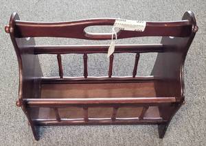 lot 600 image: WOODEN MAGAZINE RACK IN COLORSTYLE SHOWN.