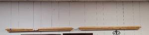 lot 610 image: 2 FLOATING WALL MOUNTING SLIM WOOD SHELVES AS SHOWN.