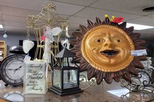 lot 628 image: TERRA COTTA SUN PLAQUE (MEXICO), ALARM CLOCK, CANDLE HOLDERS, DRESS LIKE JEWELRY HOLDER AND MORE AS SHOWN.