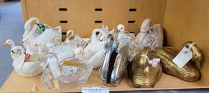 lot 630 image: ASSORTED SWANS INCLUDING PORCELAIN, ACRYLIC AND VASESHOLDERS AND MORE AS SHOWN.