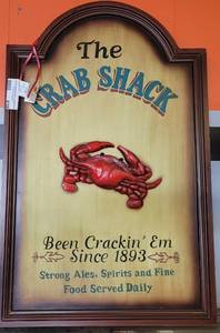 lot 638 image: THE CRAB SHACK AD-STYLE FRAMED WALL ART AS SHOWN.