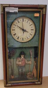 lot 656 image: SHADOWBOX CLOCK FISHERMAN. MEASURES APPROX. 9.5 X 18.5.