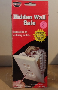 lot 8 image: US PATROL HIDDEN WALL SAFE (SHAPED LIKE A RECEPTICLE.) NIP