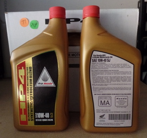 lot 79 image: Honda 08C35-A14W0M HP4 10W40 (QUART) RETAIL $9.45 EACH (X9)