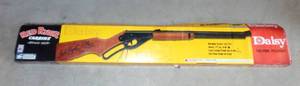lot 96 image: Daisy Model 1938 Red Ryder BB Gun - WOODBlue BB (YOULL SHOOT YOUR EYE OUT)