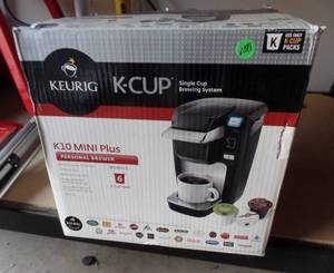 lot 100 image: KUERIG KCUP MODEL K10 PERSONAL COFFEE BREWER